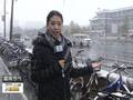 北京市区降雪仍持续市民出行需保暖